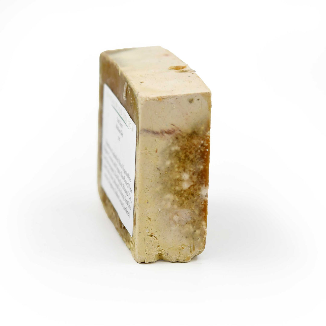 Bar of soap with a label on a white background