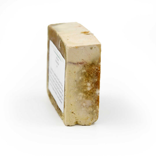 Bar of soap with a label on a white background