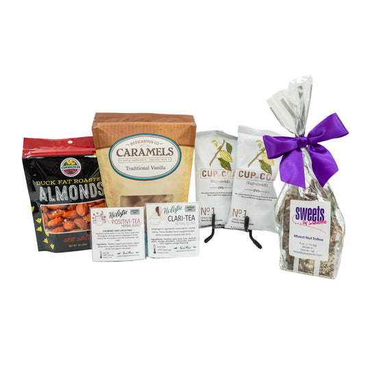 Assorted food products including almonds, caramels, and teas on a white background