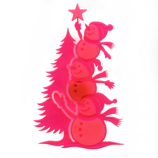 A pink layered paper cutout of four stacked snowmen holding hands and a star, set against a plain white background.