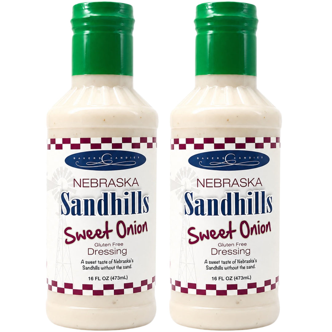Two bottles of Nebraska Sandhills Sweet Onion Dressing on a white background
