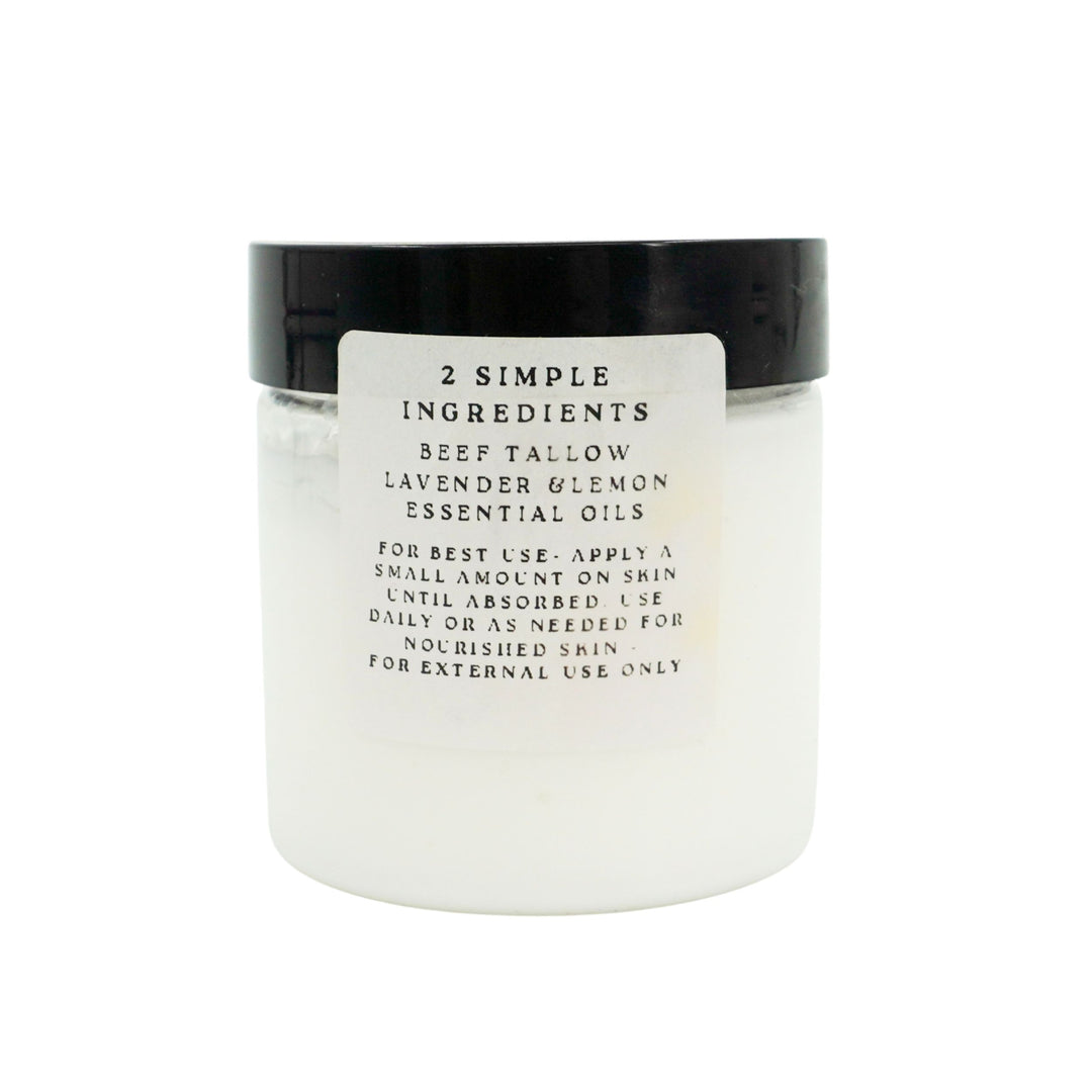 White jar with black lid on a white background