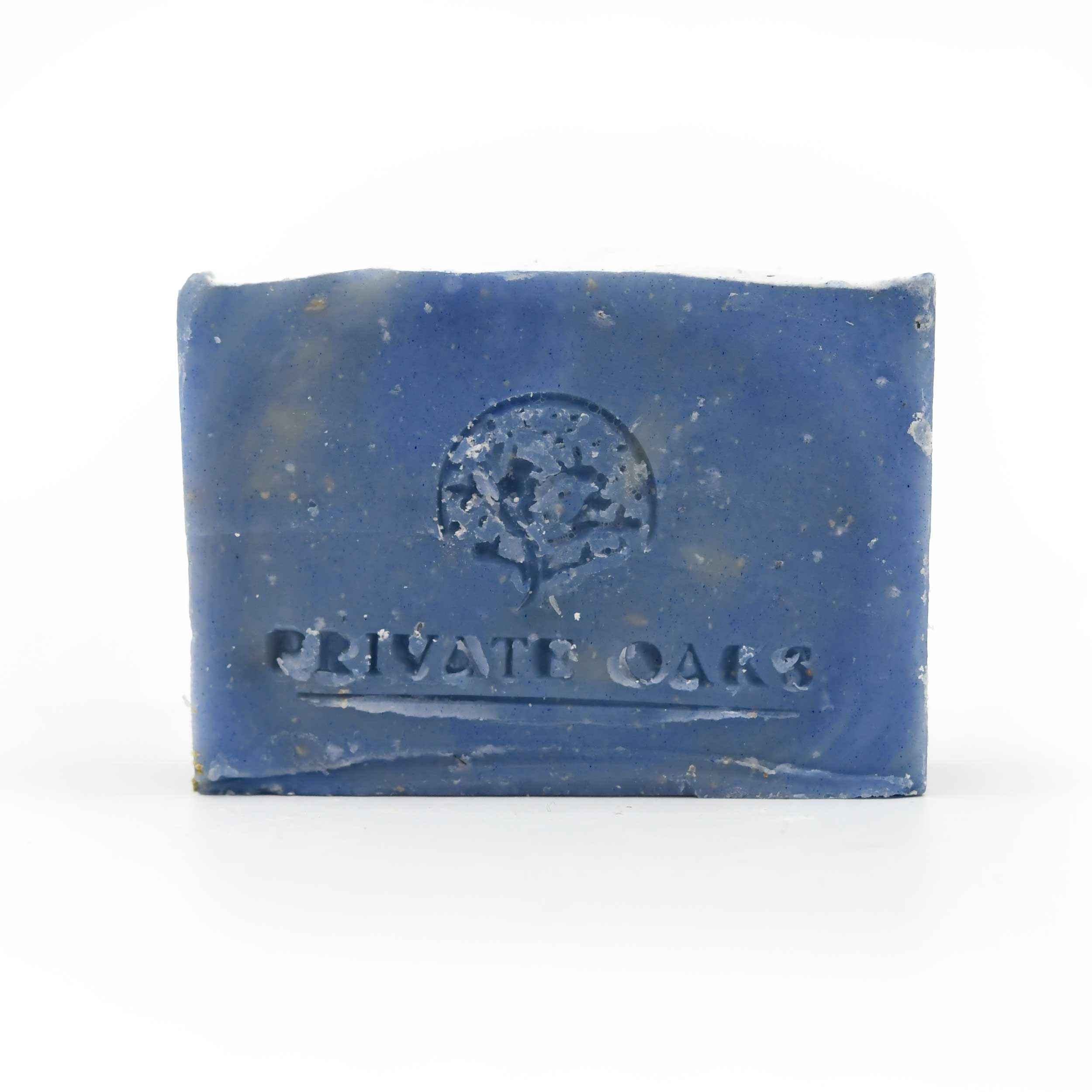 Blue bar of soap with 'Private Oaks' branding on a white background
