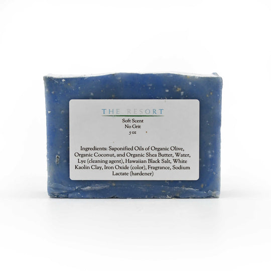 Blue soap bar with a label on a white background