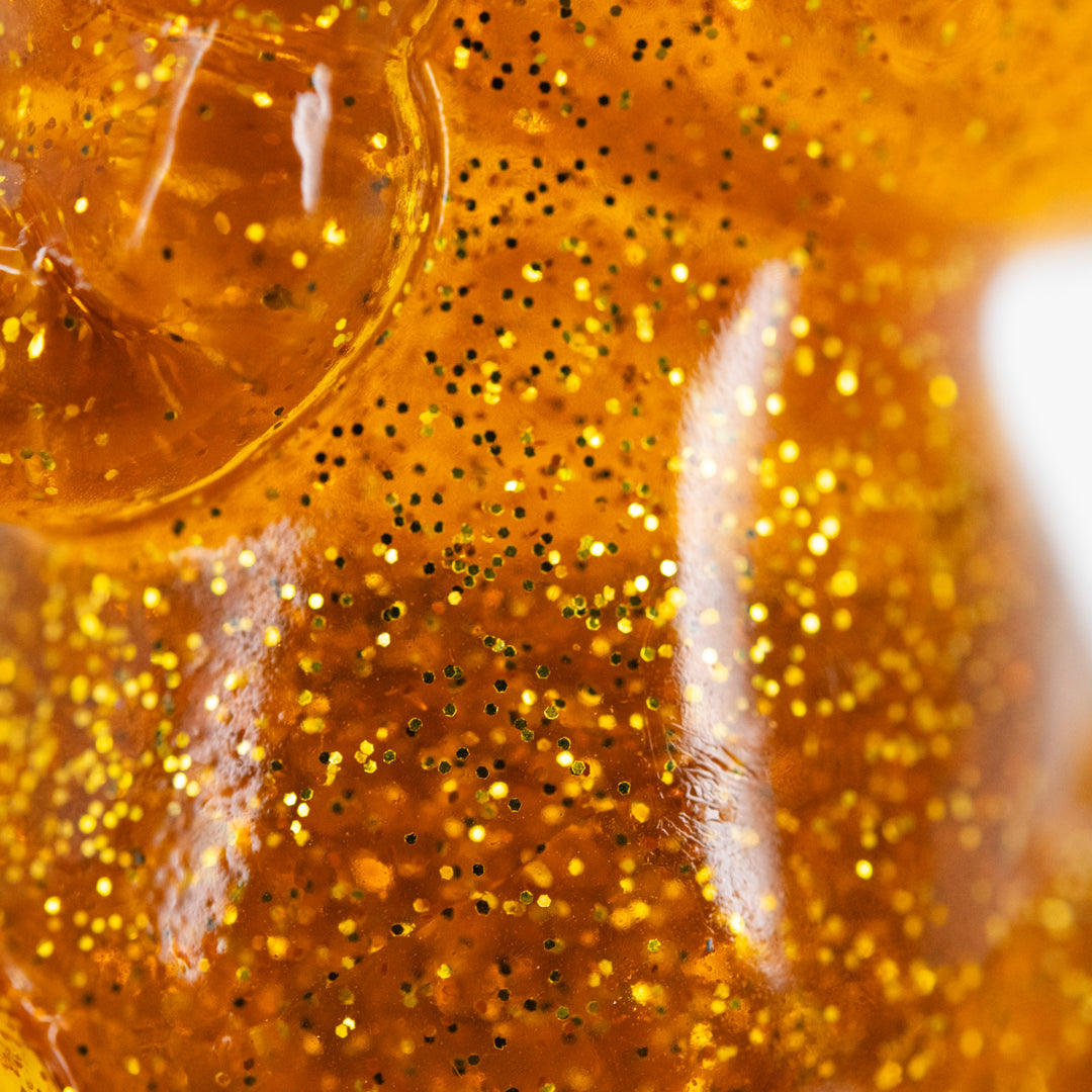 Close up of glittery yellow resin 