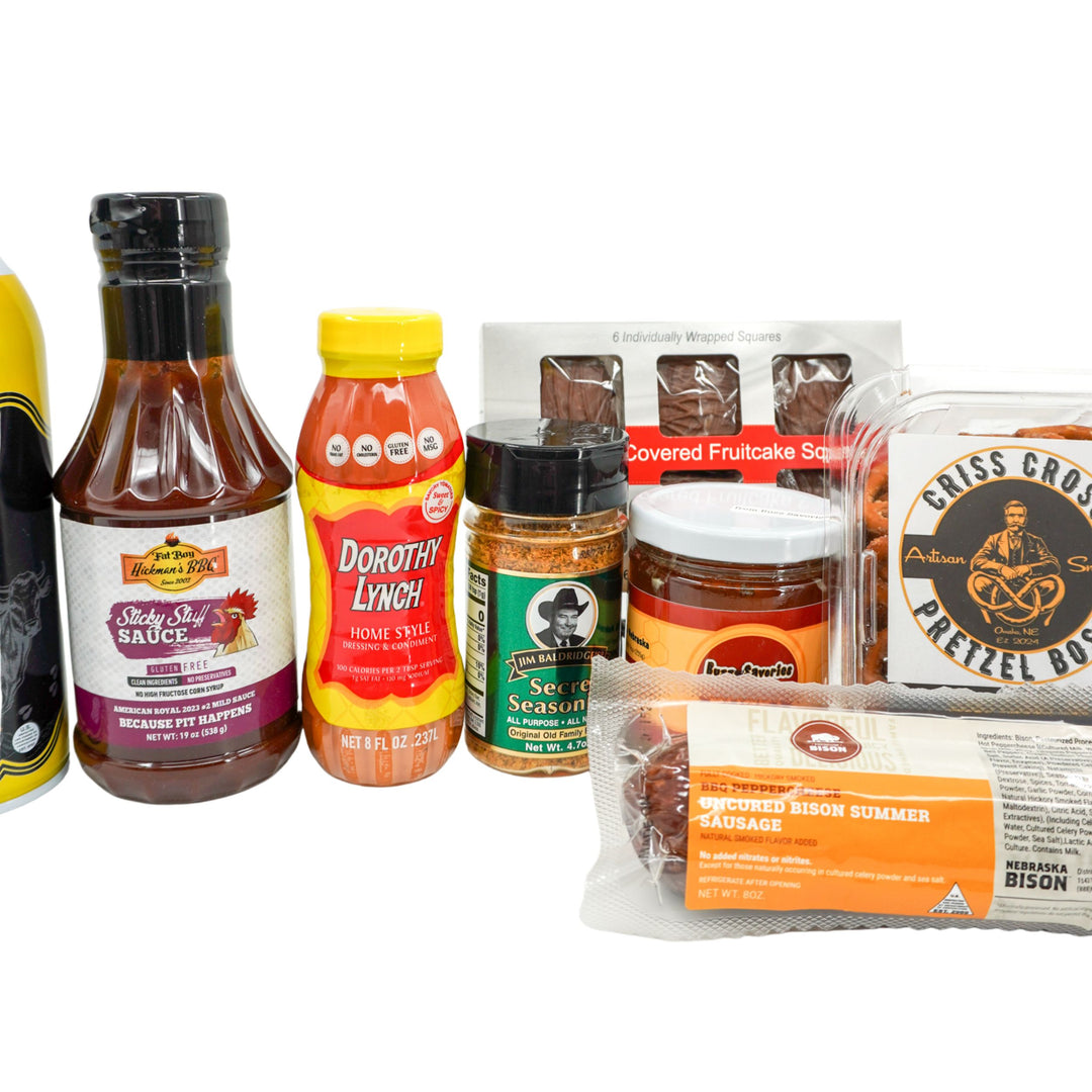 Assorted food products including sauces and a pretzel box on a white background