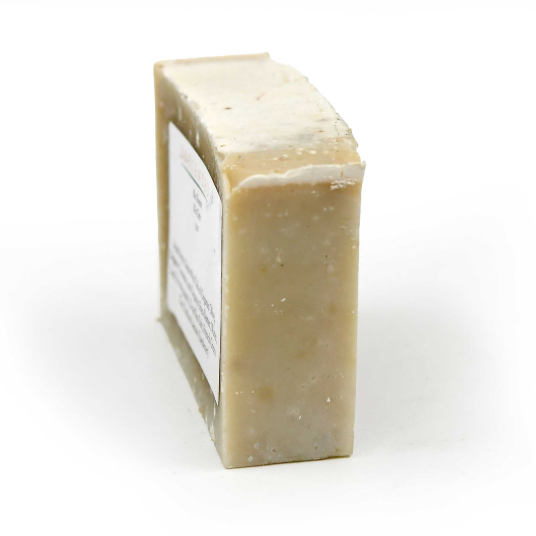 Bar of soap with a label on a white background