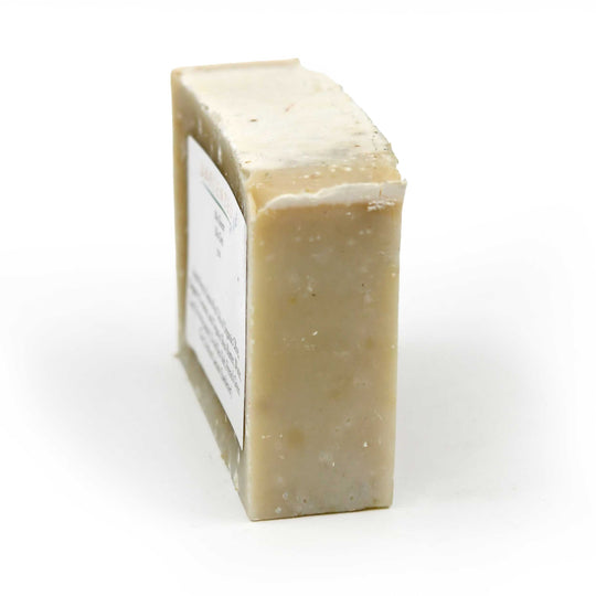 Bar of soap with a label on a white background