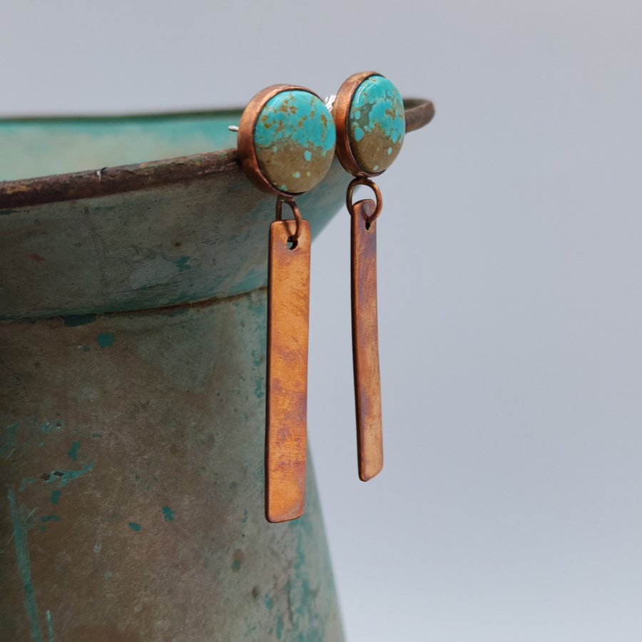 Turquoise & Copper Dangle Stud Earring Displayed on Blue Pot