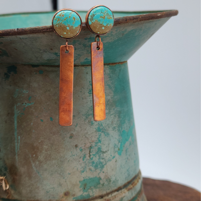 Turquoise & Copper Dangle Stud Earring Displayed on Blue Pot