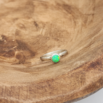 Sterling Silver Green Opal Ring on Wood