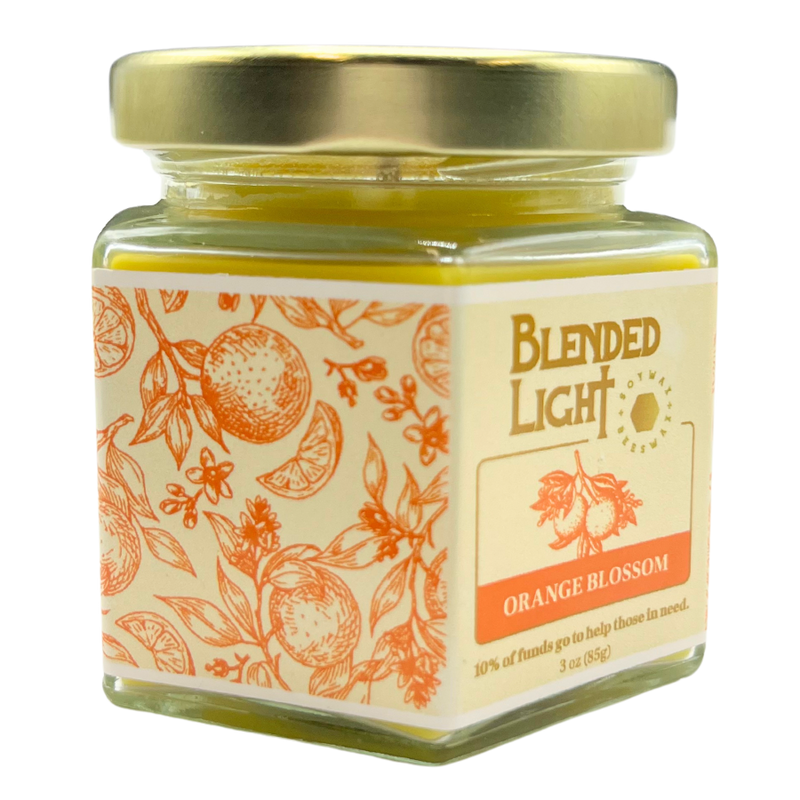 Orange Blossom Scented Candle | 3 oz. & 7 oz. Size Options | Blooming Orange Blossom Aroma | Bring the Outside in Every Day | Candle With a Purpose | Partial Funds Help Those in Need | Long-Lasting Wick Life | Nebraska Candle | Soy & Beeswax