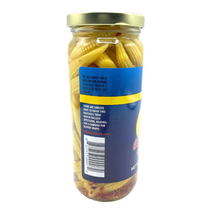 The side of a jar of pickled corn 