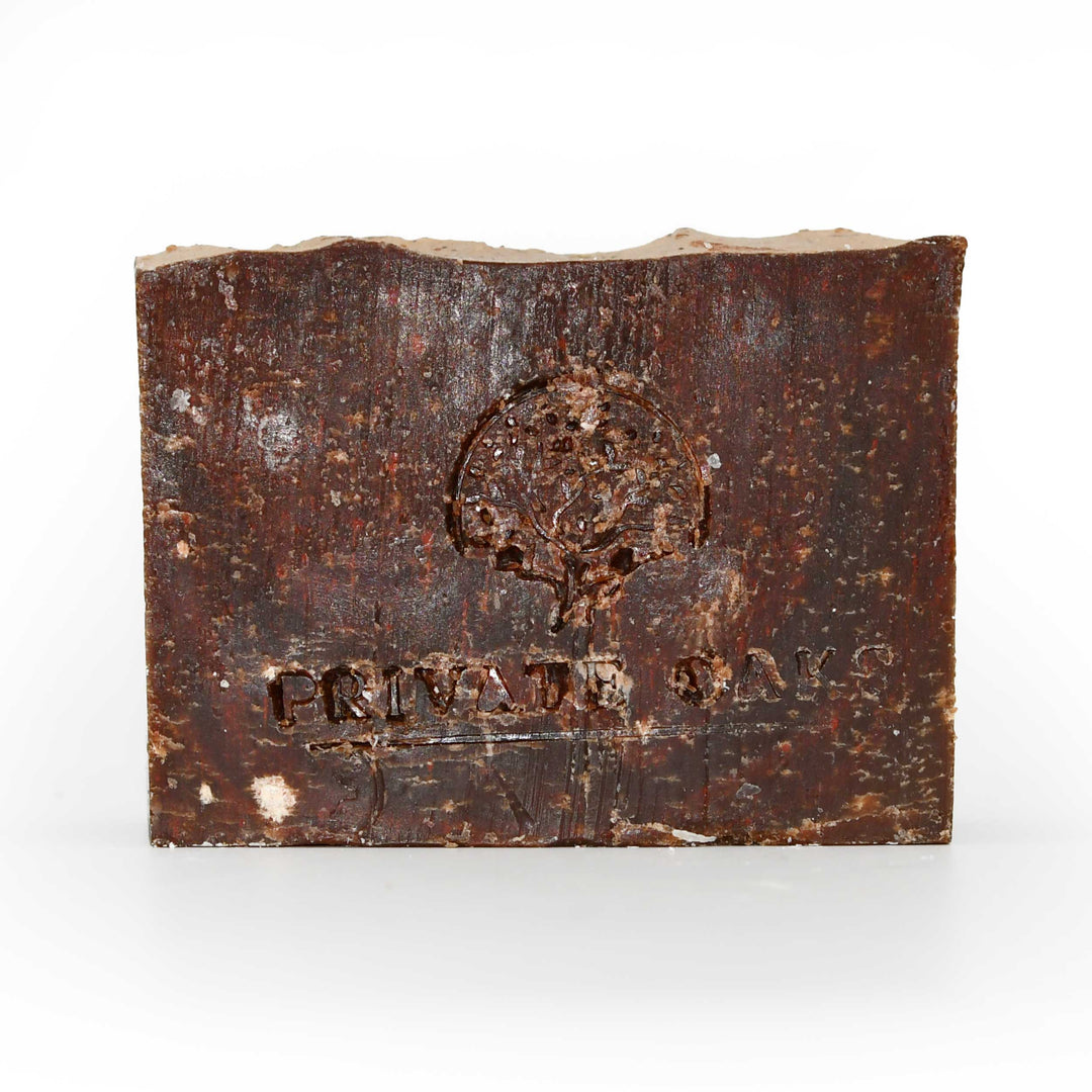 Rustic soap with a logo and text on a white background