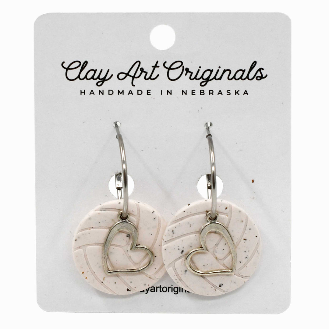 Heart-shaped earrings on a Clay Art Originals branded card