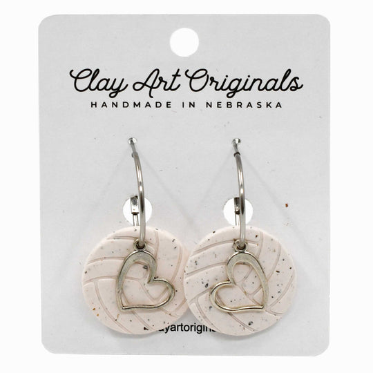 Heart-shaped earrings on a Clay Art Originals branded card