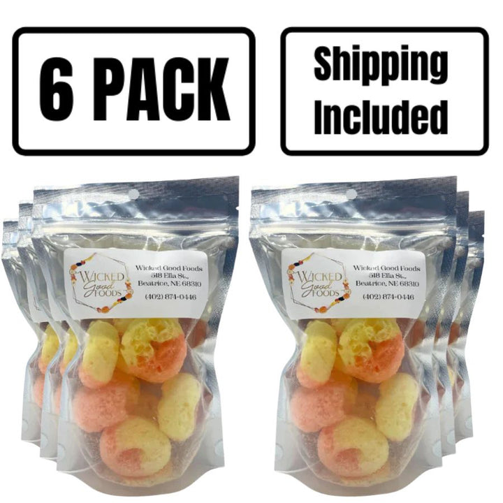 A six pack of Peach Rings on a white background