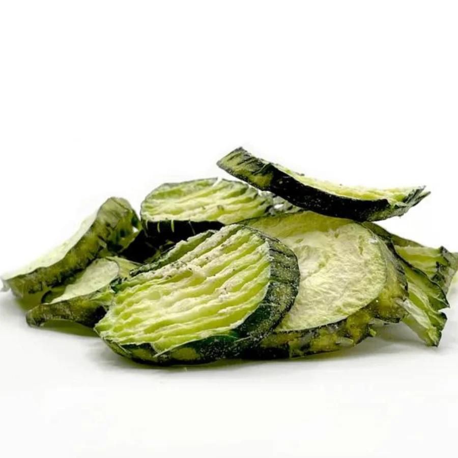 A pile of freeze dried ranch cucumbers on a white background