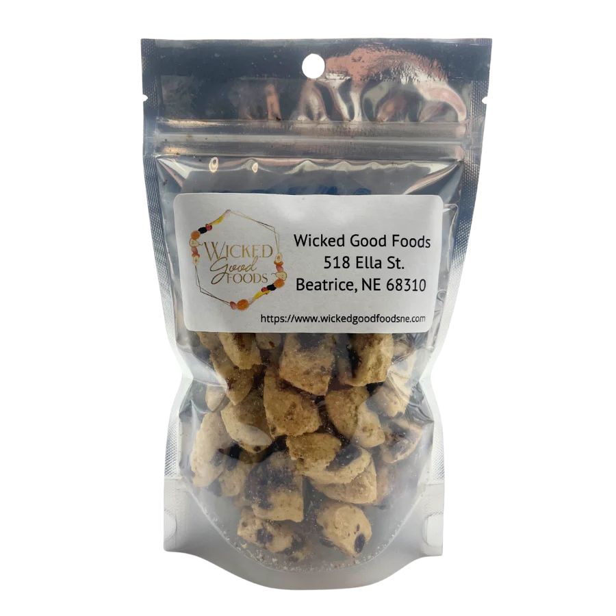 A bag of freeze dried cookie dough bites on a white background