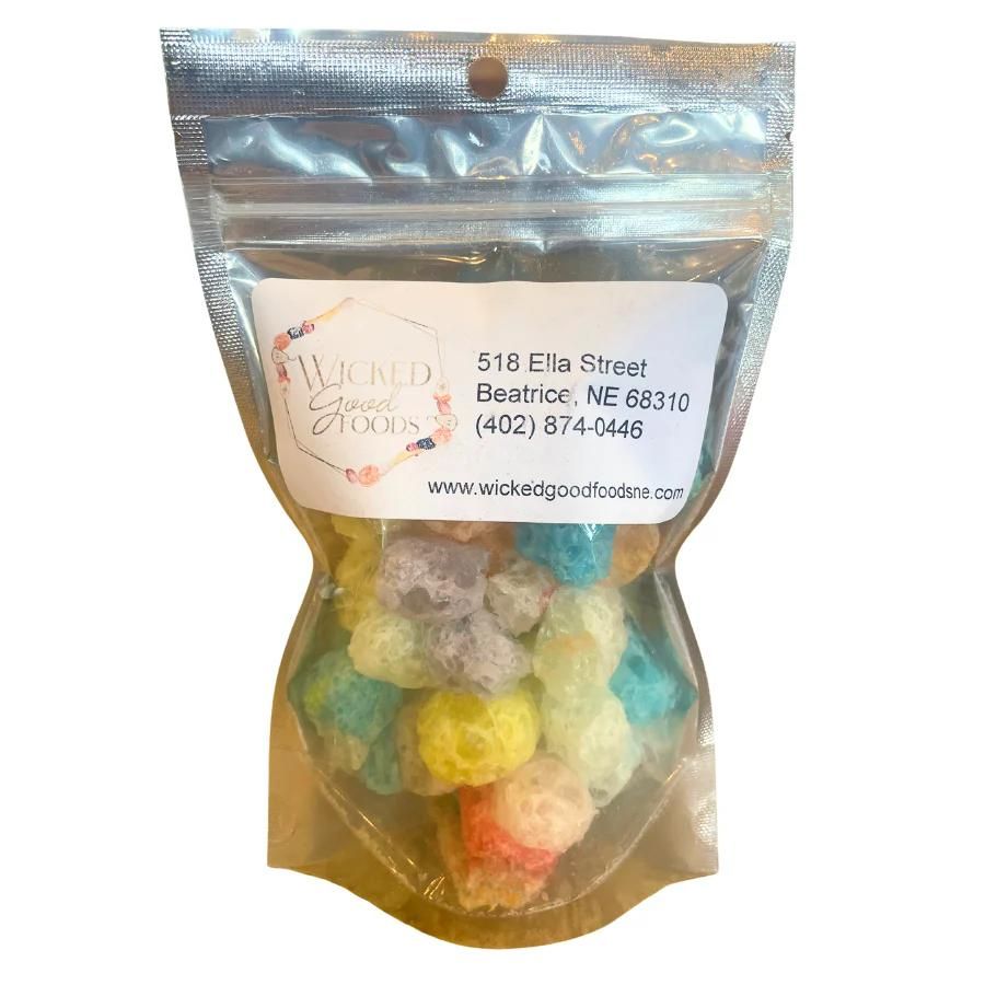 A bag of freeze dried gummy bears on a white background 