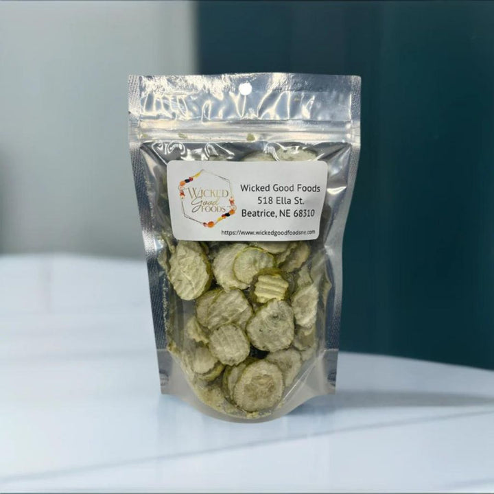 A bag of freeze dried pickles on a countertop