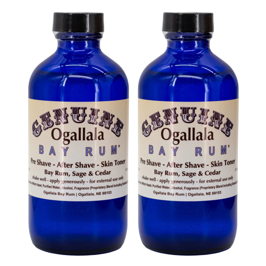 Two bottles of Ogallala Bay Rum on a white background