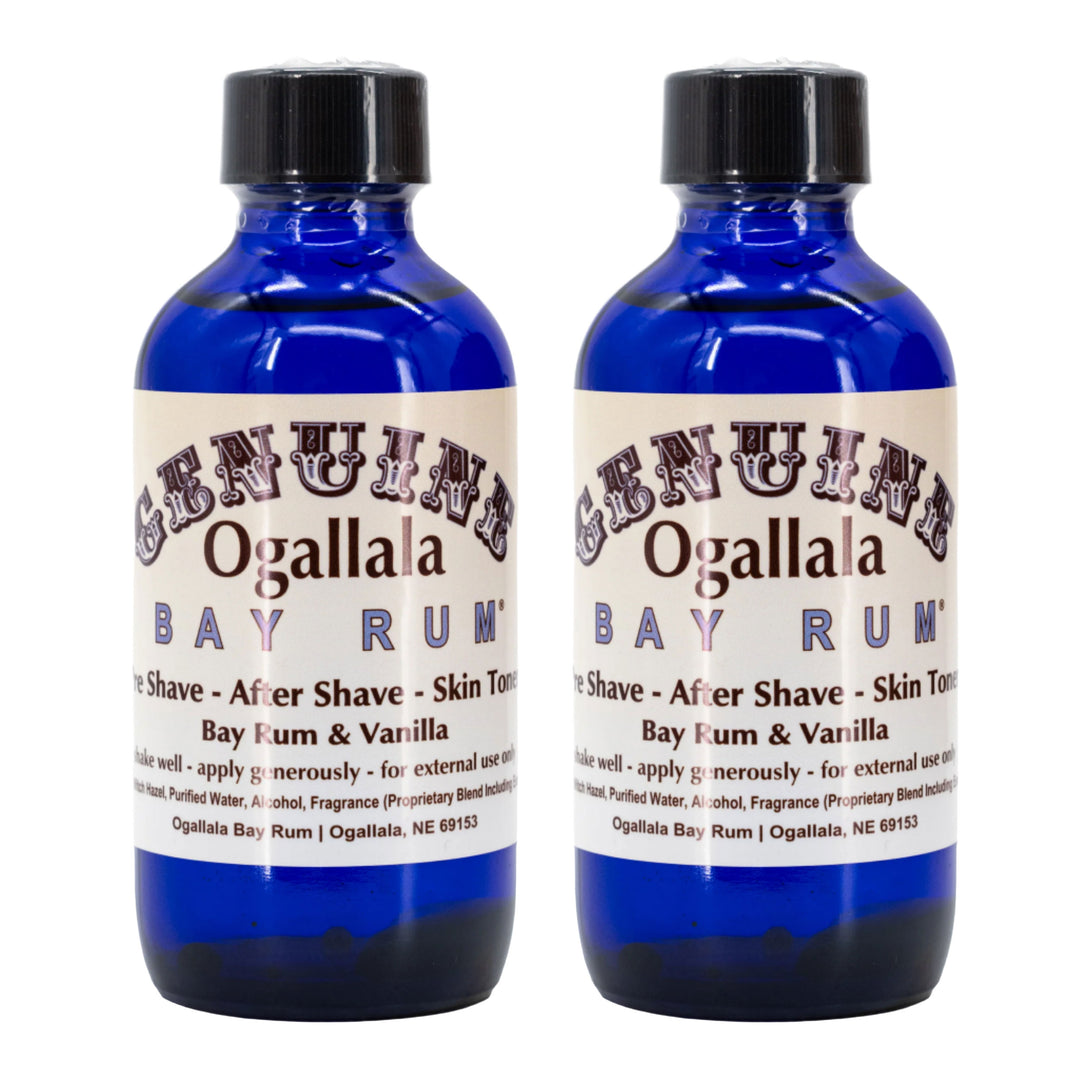 Two bottles of Genuine Ogallala Bay Rum on a white background