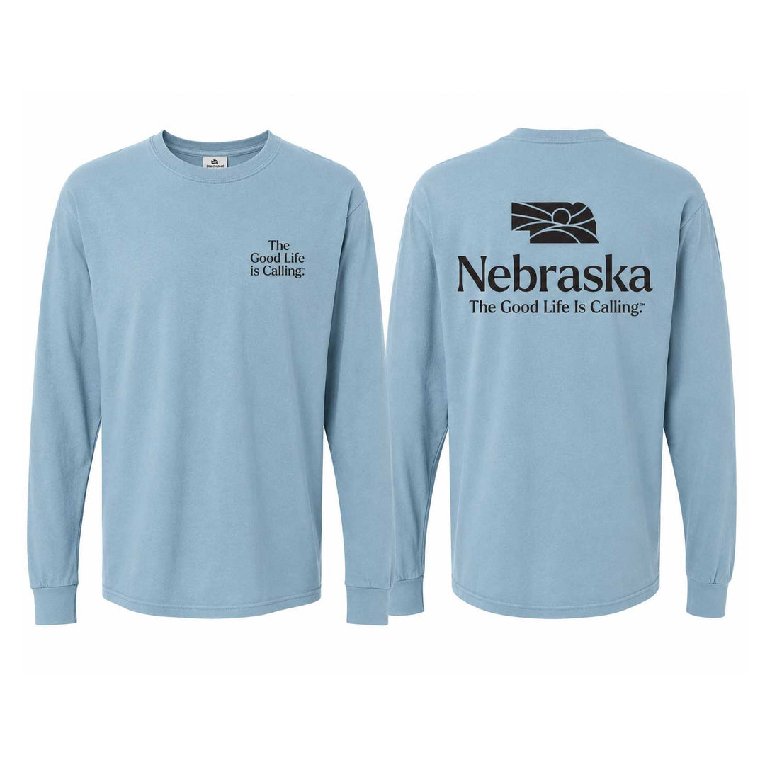 Front and back views of a light blue long-sleeve t-shirt. The front features a small black graphic on the left chest reading 'The Good Life Is Calling:'.