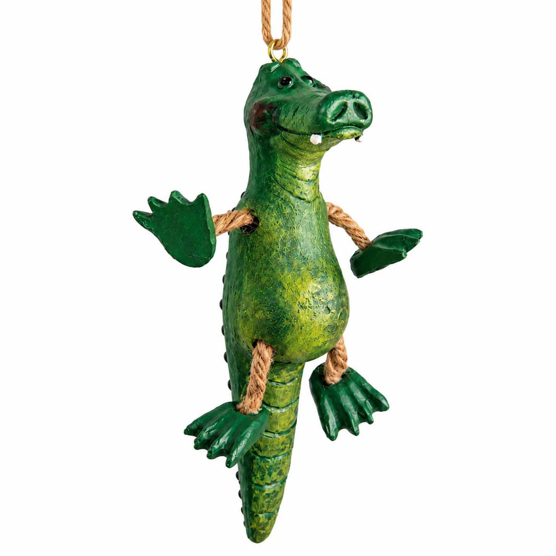 A green alligator hanging ornament with textured scales, rope details for arms and legs, and a gold hanging loop at the top, shown against a plain white background.