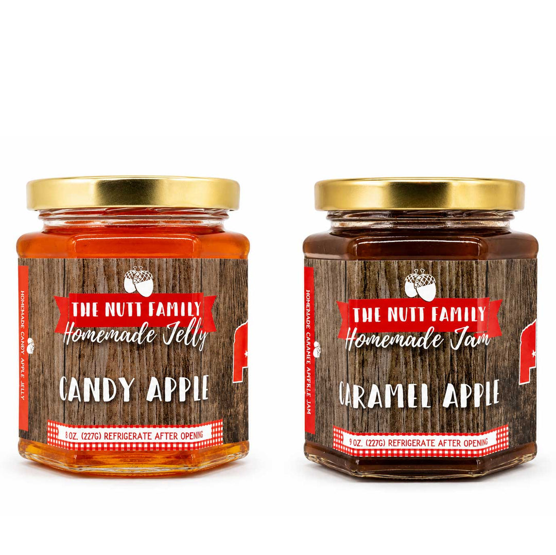 Two jars of 'The Nutt Family' candy apple jelly and caramel apple jam on a white background.