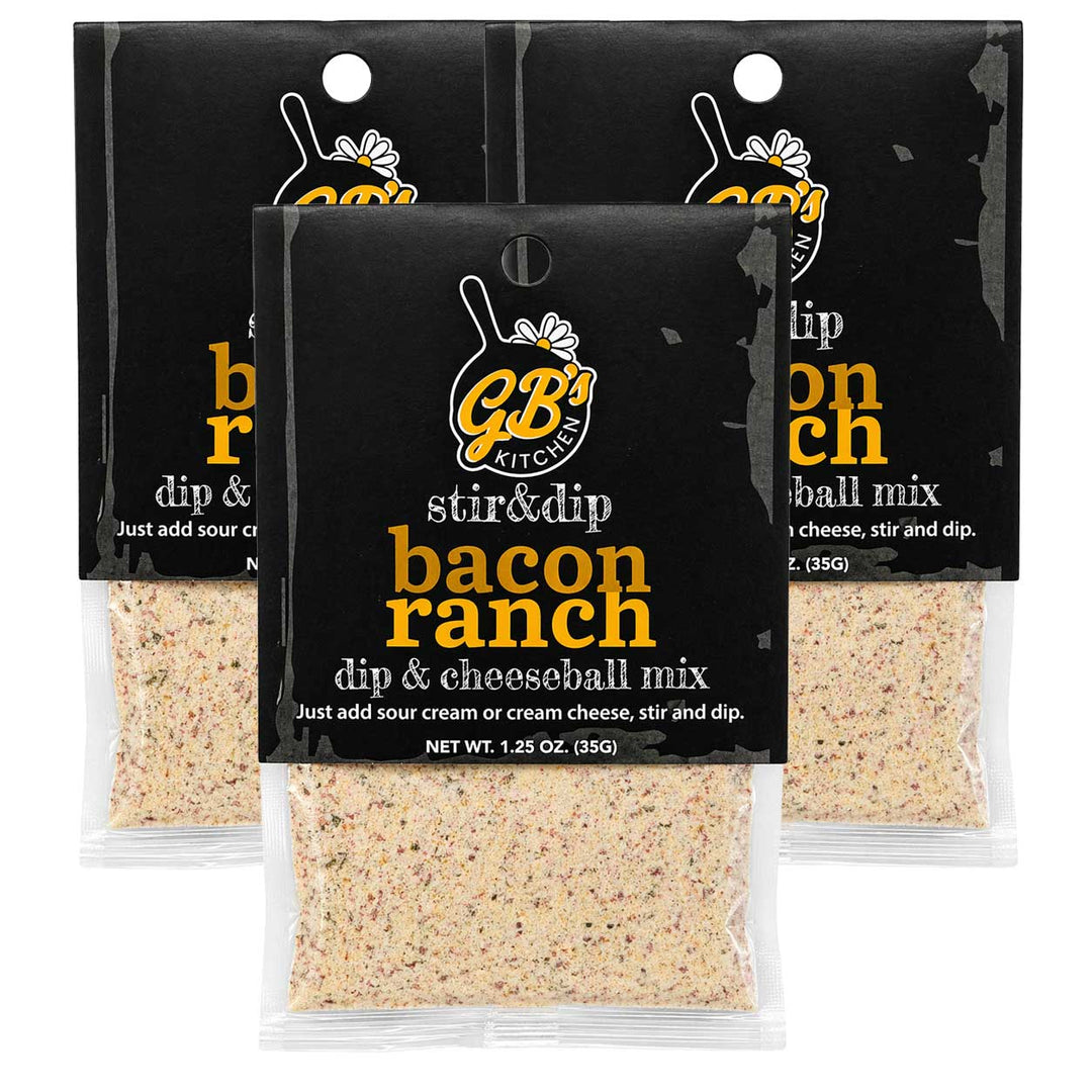 Three packages of GB's Kitchen bacon ranch dip and cheeseball mix on a white background.