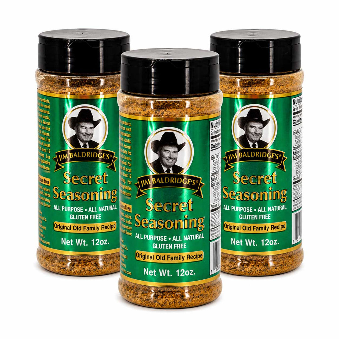 Three jars of Baldridges Secret Seasoning arranged in a triangular formation on a white background.