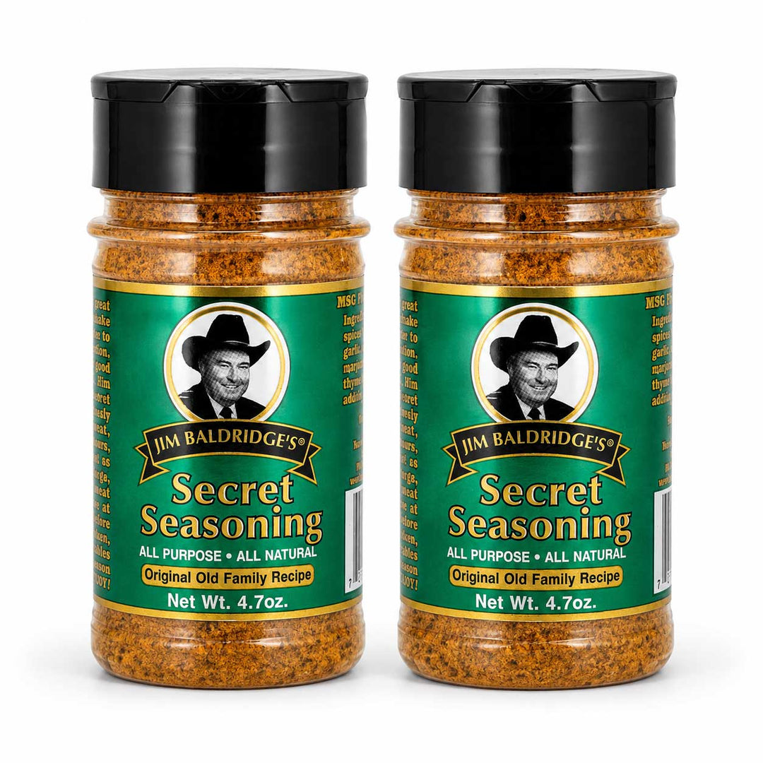 Two bottles of Jim Baldridge's Secret Seasoning displayed side-by-side on a white background.