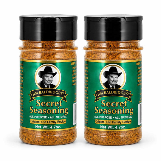Two bottles of Jim Baldridge's Secret Seasoning displayed side-by-side on a white background.