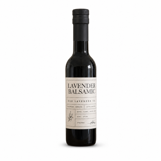 Bottle of lavender balsamic vinegar with a label on a white background