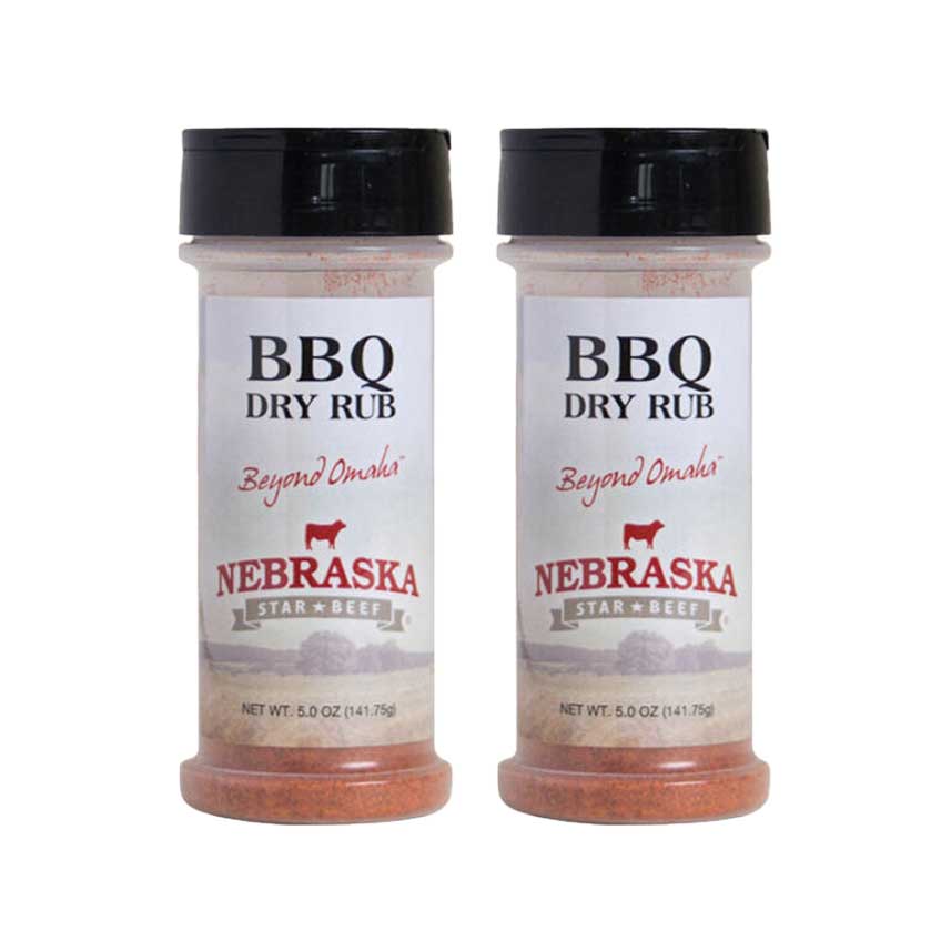 Two bottles of Nebraska Star Beef BBQ Dry Rub on a white background