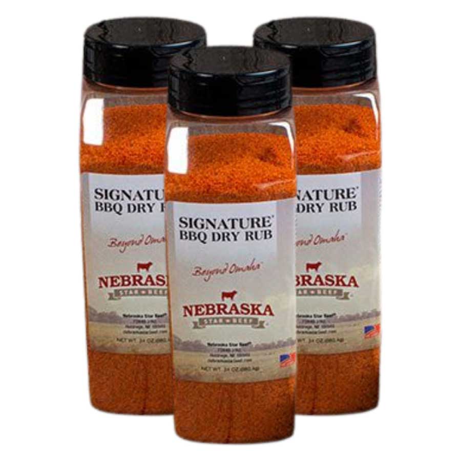 Three bottles of Nebraska Signature BBQ Dry Rub on a white background