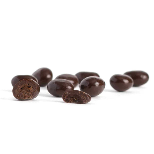Chocolate-covered coffee beans on a white background