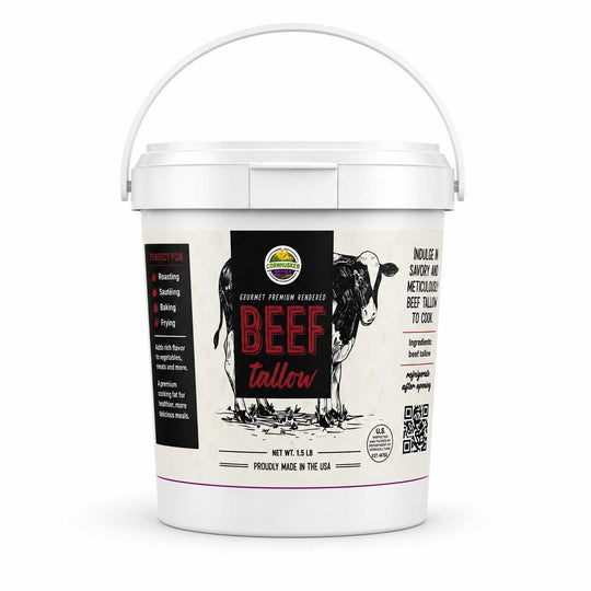 A white plastic bucket of Beef Tallow dry cow manure fertilizer by Livestock Pro Products, featuring a detailed label with a black and white cow illustration and red text.