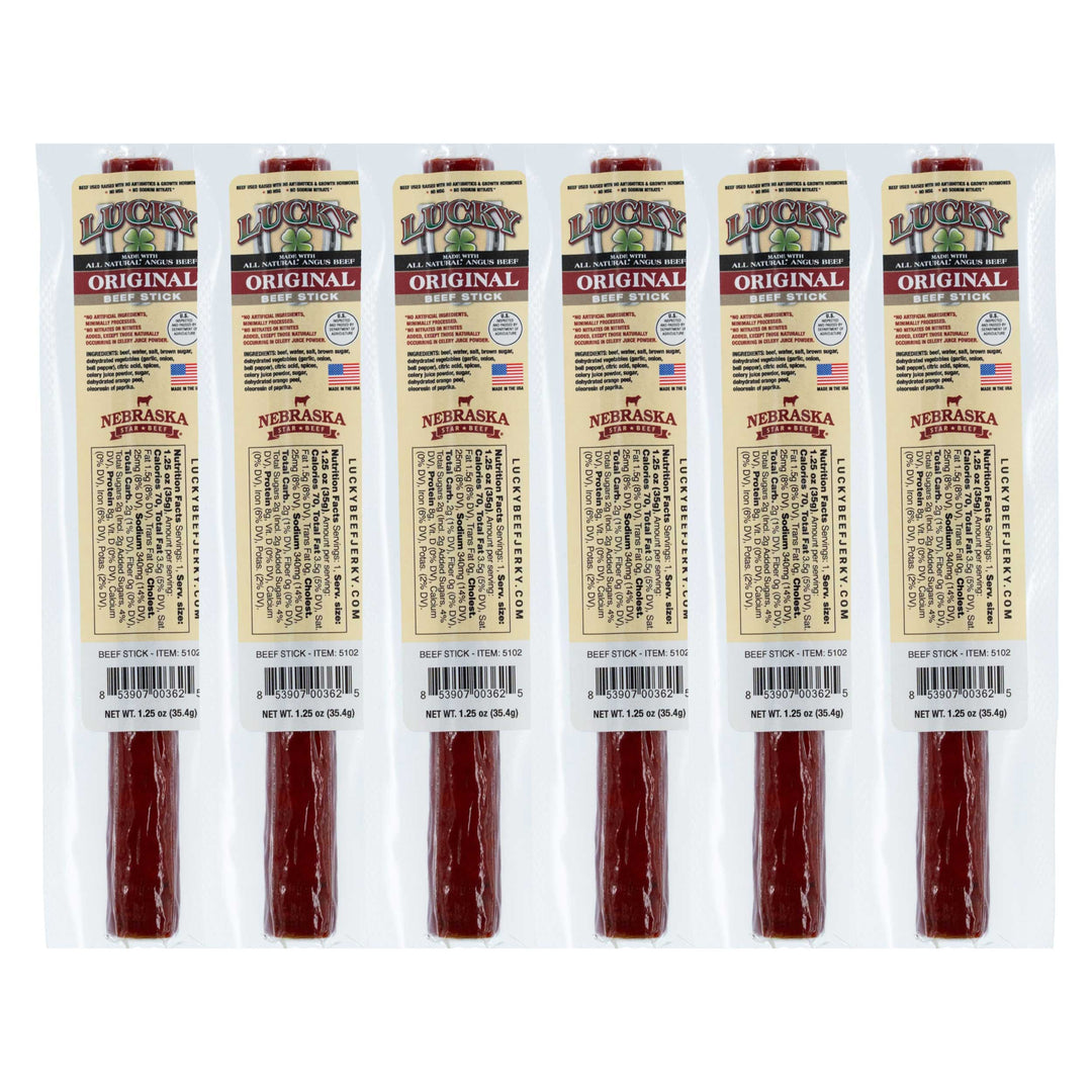 Six packages of Lucky Original Nebraska beef sticks on a white background