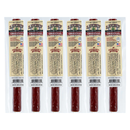 Six packages of Lucky Original Nebraska beef sticks on a white background