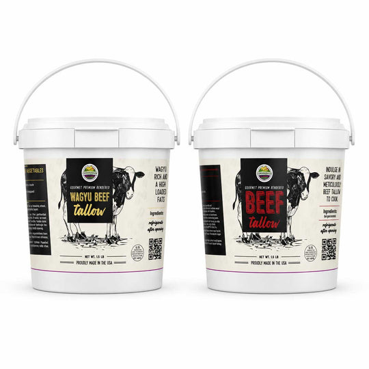 Two white plastic buckets of Wavy Beef Tallow supplement with handles, shown side by side on a white background. The left bucket shows the back label with ingredients and QR code, and the right bucket shows the front label with a cow illustration and 'BEEF tallow' in red text.