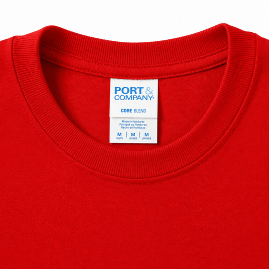 Red shirt with a Port & Company label on a white background