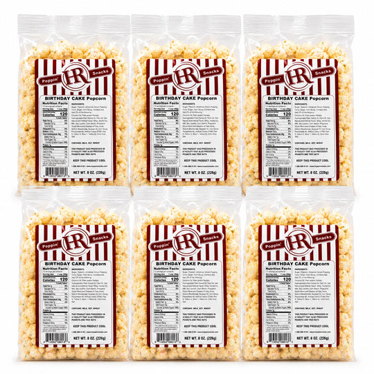 Six clear plastic bags of BR Bakes Birthday Cake Popcorn arranged in a 2x3 grid on a white background, showing the product and nutrition labels.