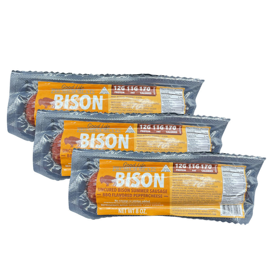 Three packages of Bison summer sausage on a white background