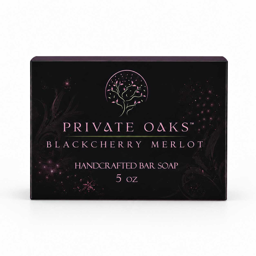 A rectangular black bar soap box for Private Oaks Blackberry Merlot, featuring a pink tree logo and text, set against a plain white background.