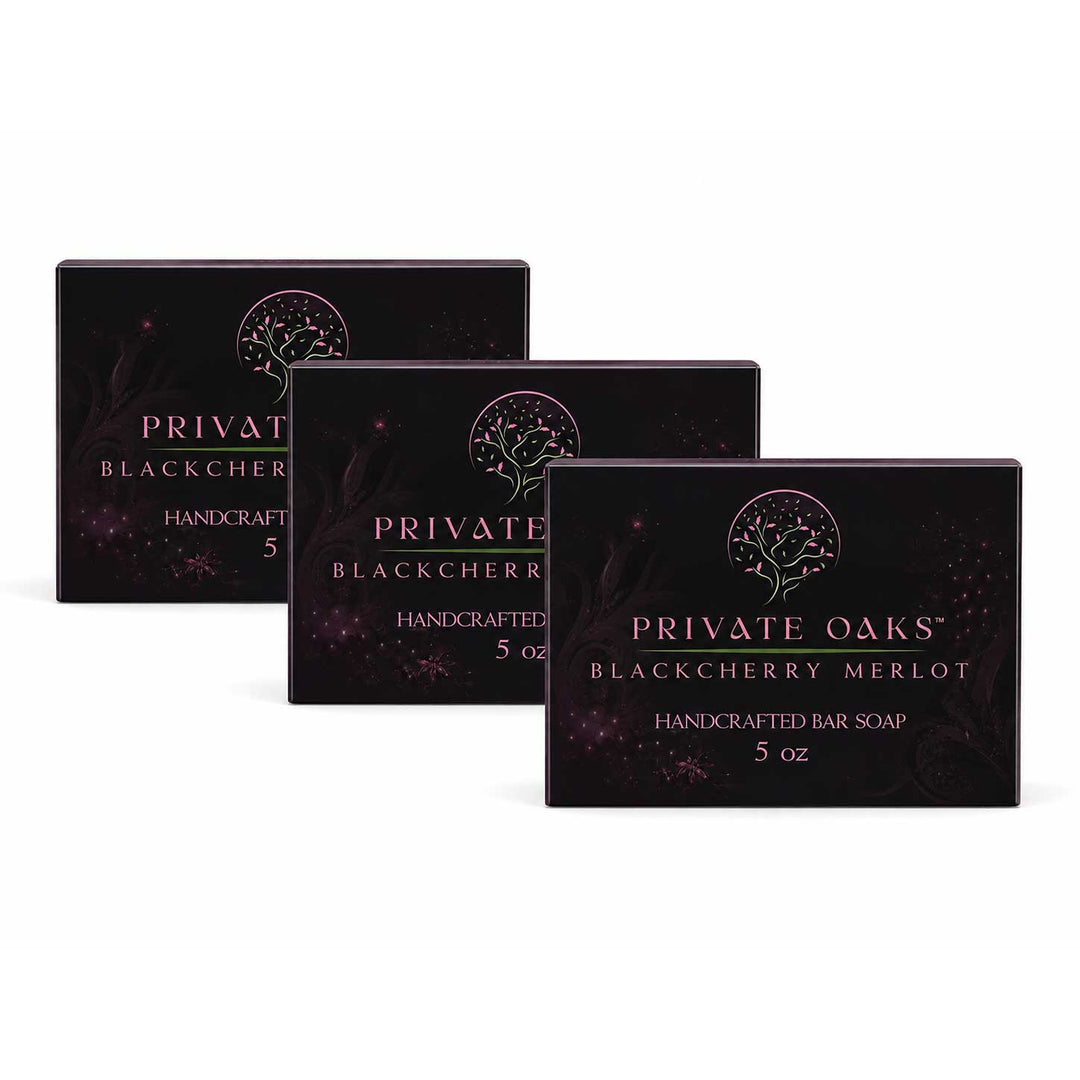 Three rectangular boxes of Private Oaks Blackberry Merlot Handcrafted Bar Soap arranged in a staggered row on a plain white background.