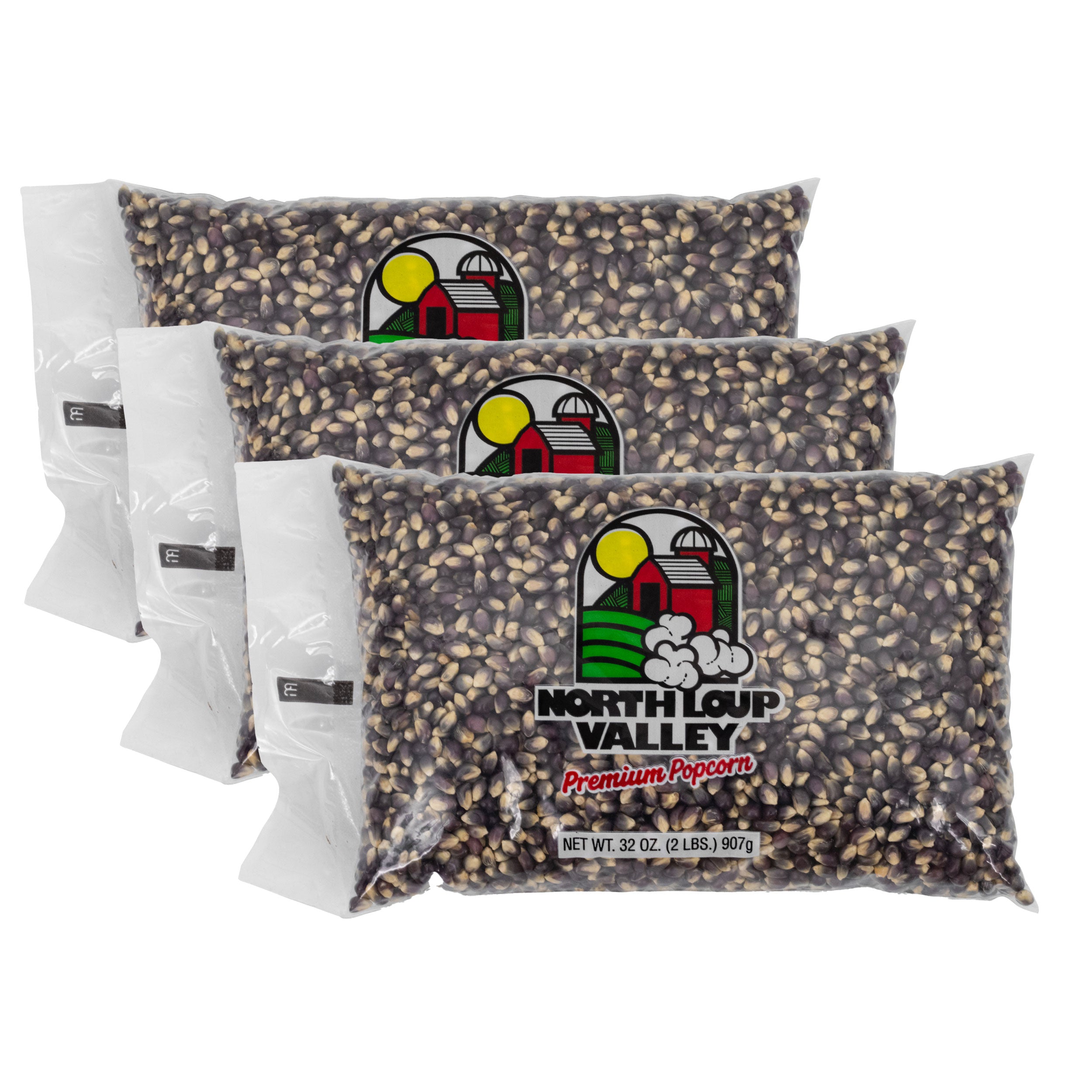 Three bags of North Loup Valley blue popcorn on a white background
