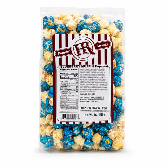 A 7 oz bag of Poppin' Blueberry Muffin Popcorn by HH Snacks, showing the blue and yellow popcorn inside a clear plastic bag with a red and white striped label.