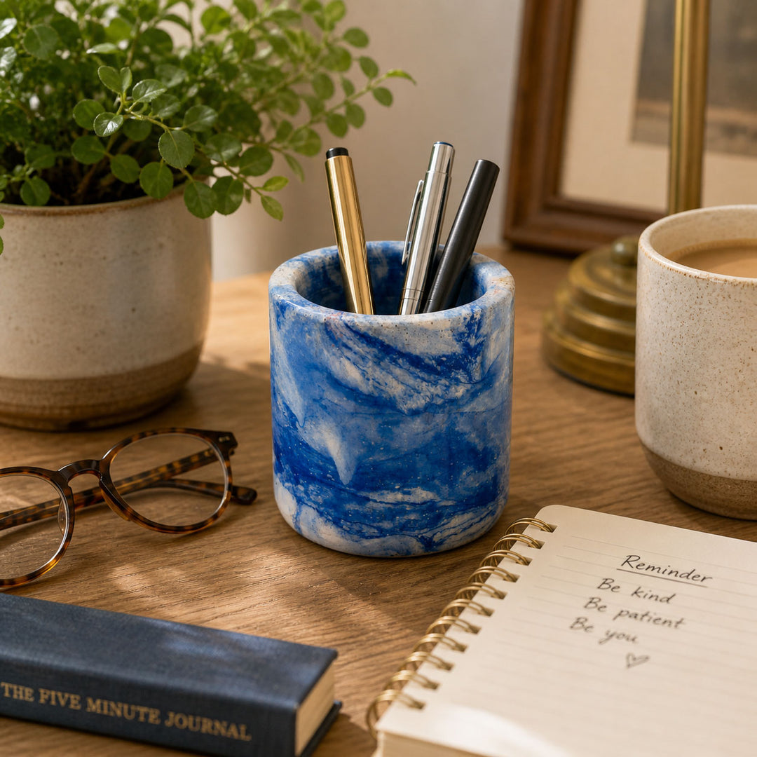 Blue concrete pen holder on desk